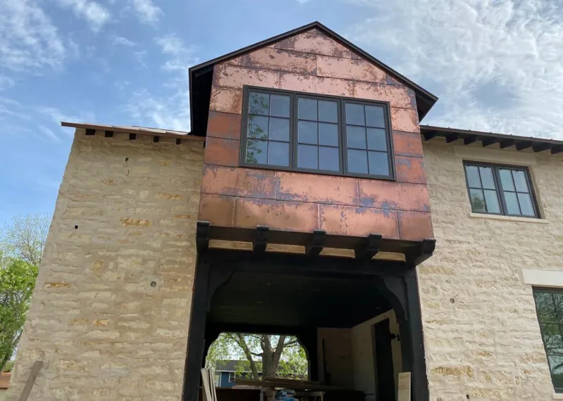 Copper metal panel facade on a stone building for Metal Roof Coating in Esopus